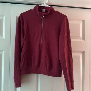 Woman’s dusty rose medium sized pullover